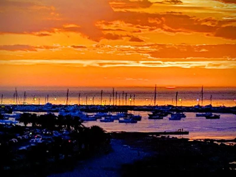 Orange sunset over a harbor